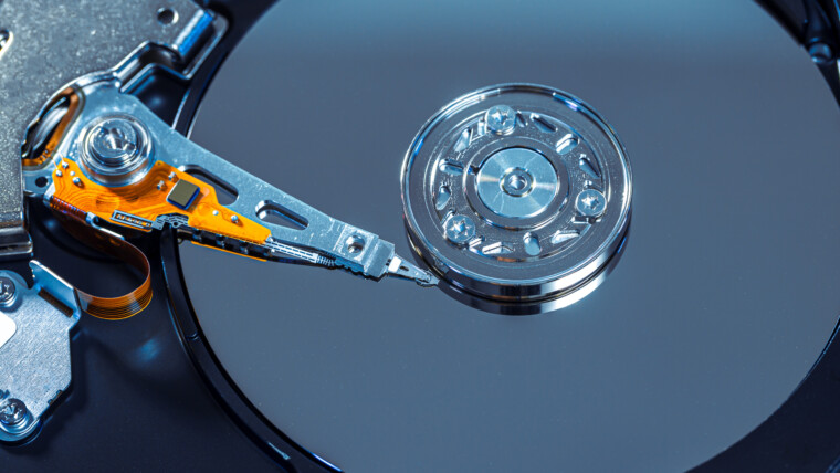 Close up of hard disks internal mechanism hardware