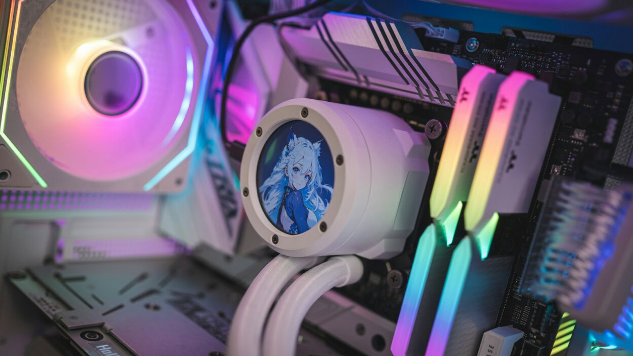 a close up of a computer motherboard with colorful lights