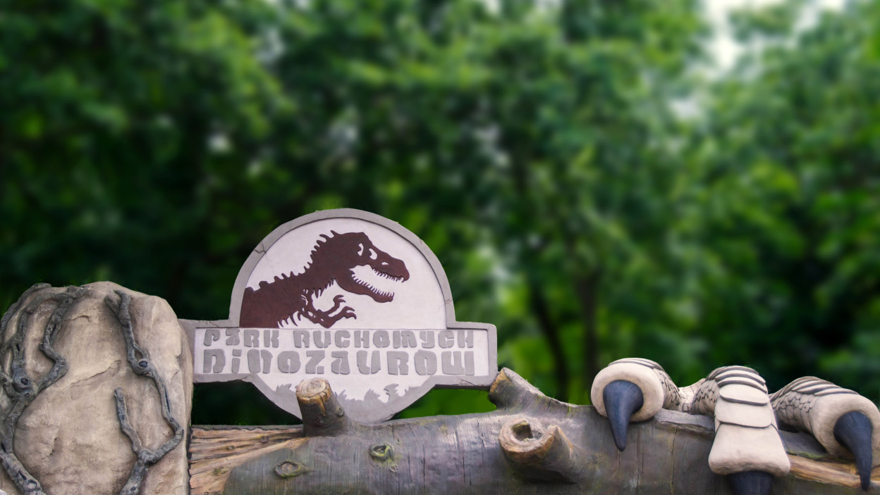 Znak z napisem dinozaur