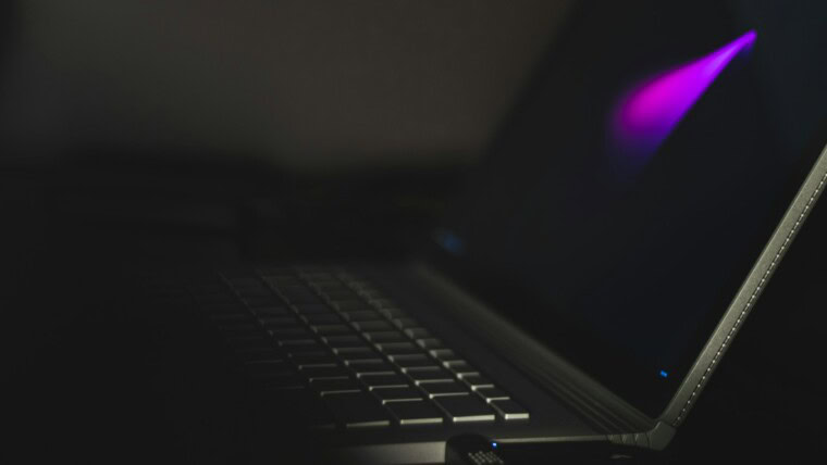 USB flash drive attached to laptop computer