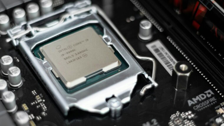 Intel processor on black motherboard