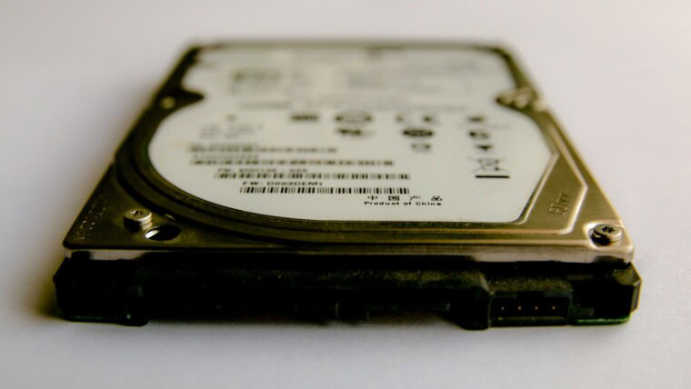 silver and black hard disk drive